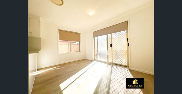 Immaculate 4-Bedroom Home in Prime Location Of Hinchinbrook - Photo 1