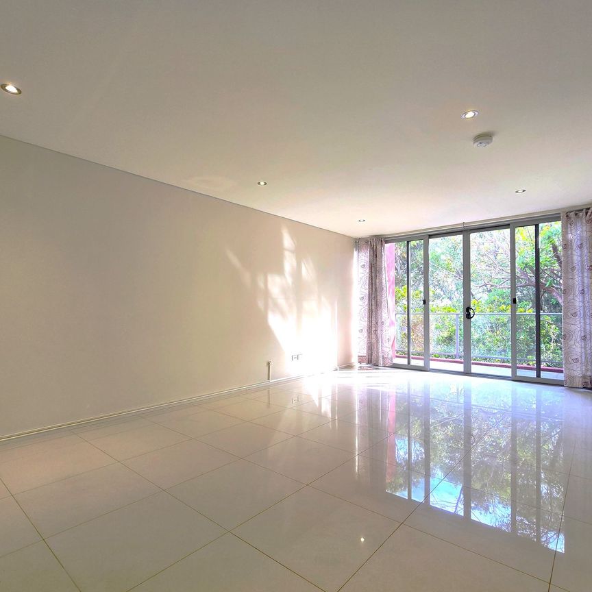 FOOTSTEPS TO TO ALL AMENITIES - MODERN TWO BEDROOM APARTMENT - Photo 1