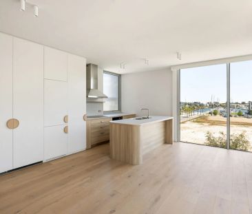 Waterfront Living at Its Finest – Stylish 1st Level Apartment - Photo 5