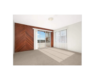 Bright 2-Bedroom Apartment with Balcony and Secure Garage - Photo 1
