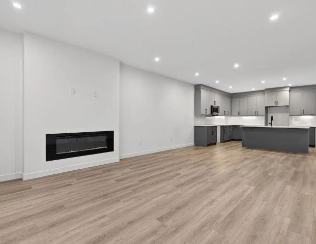 Brand New 4+ Bedroom Townhouse In ALCES SW — 4 Bedrooms+ Den Townhouse - Photo 1