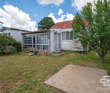 COMFORTABLE FAMILY HOME - Photo 1