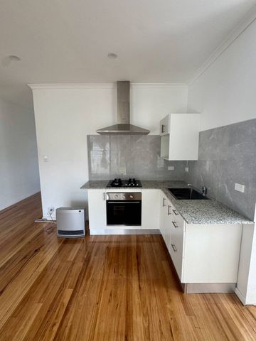 Renovated 3-Bedroom Home with Spacious Yard & Entertainment Area - Photo 3