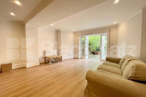 Spread over the ground floor of this stunning period building - Photo 1