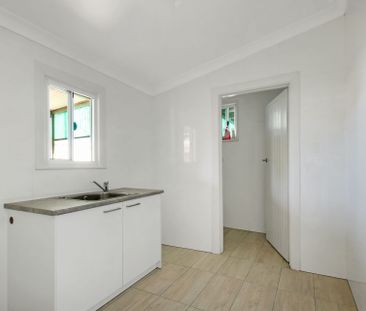 Fully Renovated Family Home Close to City & Coast - Photo 4