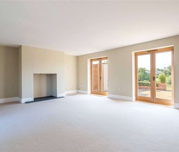 An exquisite four bedroom, four bathroom barn conversion with South... - Photo 1