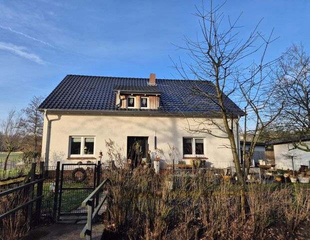 Moderne Erdgeschosswohnung in idyllischer Waldrandlage - Ruhe und Komfort vereint! - Foto 1