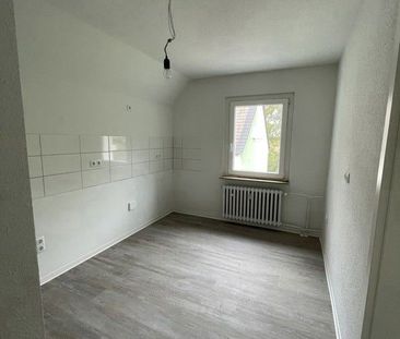 Attraktiv! Ansprechende 2,5-Zimmer-Dachgeschosswohnung in grüner Um... - Photo 4