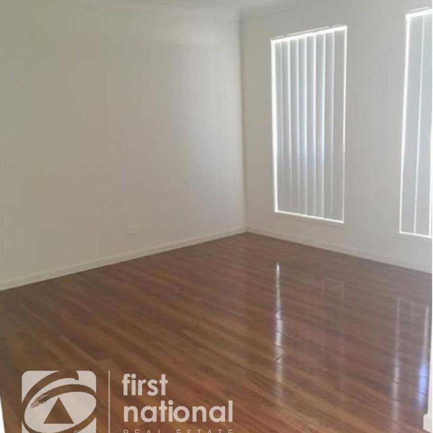 Modern 4-Bedroom Family Home - Photo 1