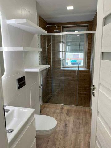 Po remoncie, bardzo eleganckie mieszkanie 2 pokoje - Photo 5