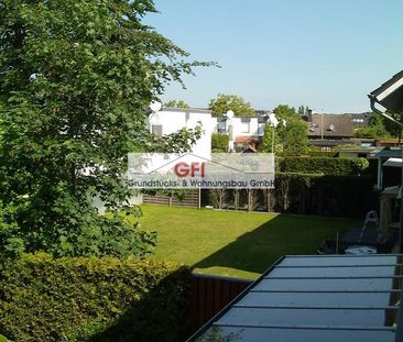 Obergeschosswohnung mit eigenem Garten, Garage und Balkon! - Foto 1