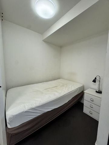 Fully Furnished 1-Bedroom Apartment with Study and Balcony - Photo 3