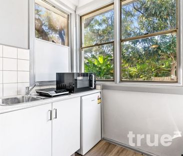 SELF CONTAINED, RENOVATED AND FURNISHED STUDIO - Photo 3