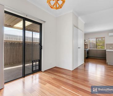 IMMACULATE AND WELL APPOINTED THREE BEDROOM HOME - Photo 2