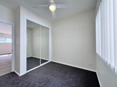 Fully Renovated Family Home with Air Conditioning - Photo 2