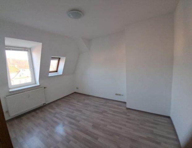 Niedliche Dachgeschosswohnung - Foto 1