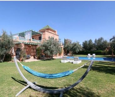 Maison au coeur d'un jardin luxuriant dans la Palmeraie de Marrakech - Photo 6