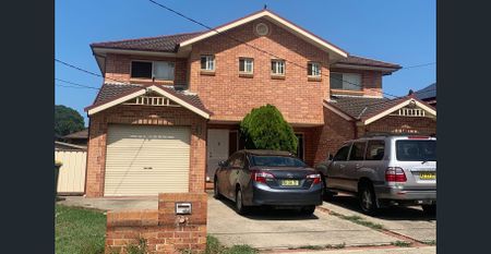 MODERN 3BR HOME WITH LARGE REAR YARD + PARKING - Photo 3