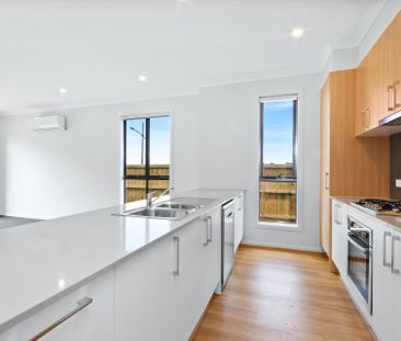 Charming 3-Bedroom Family Home with Modern Comforts and Low-Mainten... - Photo 4