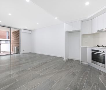 Modern two bedroom unit - 20% below market rent - Photo 2