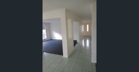 BRIDGEMAN DOWNS MUST SEE 4 BEDROOM LOWSET HOME - Photo 2