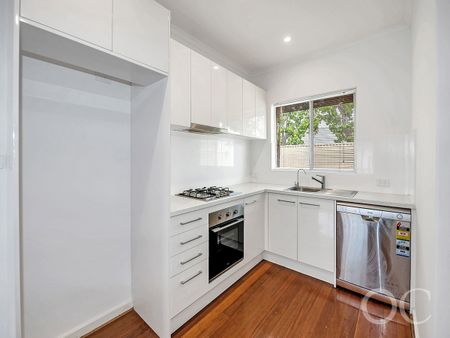 Open the Door to Light-Filled Living with a Private Courtyard Retreat - Photo 5