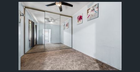 Charming 3-Bedroom Home with Spacious Yard in Elizabeth Downs - Photo 4