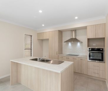 Where Luxury Meets Comfort in This Impressive Residence! - Photo 2