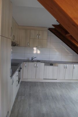 Rent a 2 ½ rooms duplex in Courchapoix - Photo 1