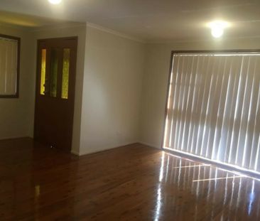 Charming 3-Bedroom Home with a Spacious Backyard! - Photo 1