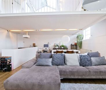 Stunning loft style apartment within a landmark Victorian school conversion - Photo 4