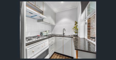 Beachside Living in Modern Furnished Apartment - Photo 4