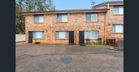 Well-Maintained Two Bedroom Unit - Photo 2