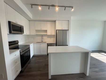 Unit 435- Beautifully Designed/ 2 Bedroom Plus Den Condo at The Grove - Photo 2