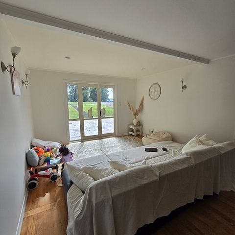 Charming 3BR Home with Deck in Waiuku - Photo 1