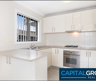 Spacious Townhouse with Large Backyard & Double Garage - Photo 3