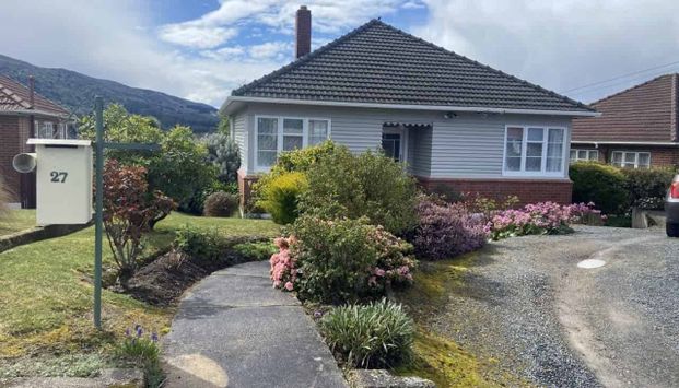 Bright 2-Bedroom Home in Wakari - Photo 1