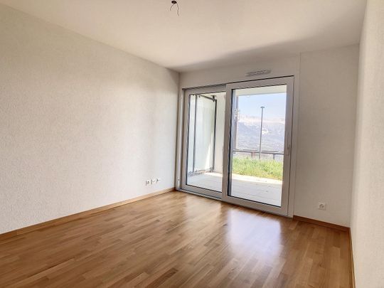 Bel appartement de 3.5 pièces au rez bénéficiant d'une belle terrasse. - Photo 1