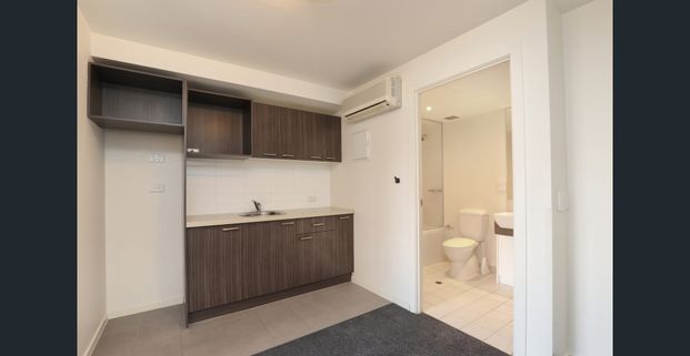 UNI AROUND THE CORNER FROM THIS LITTLE GEM - Photo 1