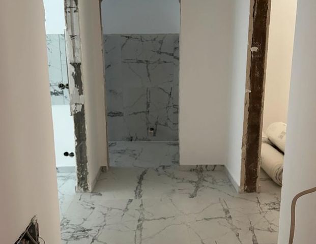 Ich biete eine schöne neu sanierte Erdgeschosswohnung in Essen an - Foto 1