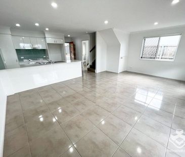 Townhouse - Garage and Carport - Photo 1