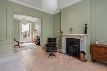 An impressive five bedroom Victorian family home, showcasing beautiful period character throughout and offering expansive and versatile living space. - Photo 2