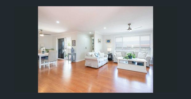 Modern Renovated Family Home With Expansive Deck & Garden Maintenance Included - Photo 1