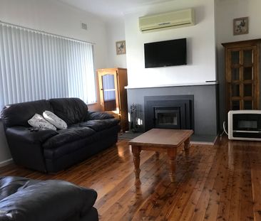 Charming Three-Bedroom Home - Comfort, Space & Convenience - Photo 1