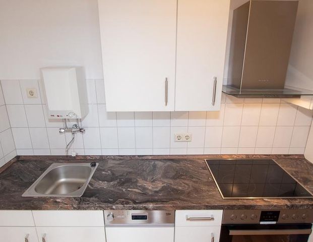 großzügiges 1 Zimmer Appartment, Bad mit Dusche, Laminat, Lift, Einbauküche! - Photo 1