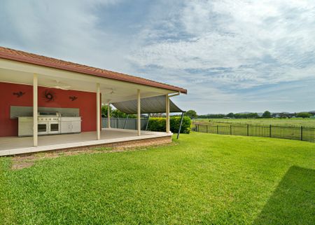 Modern Three Bedroom Overlooking Lush Farmland - Photo 4