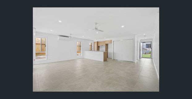 Brand New 4-Bed Family Home with Spacious Yard - Photo 1