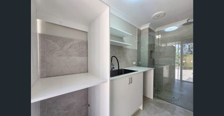 Stylish & Spacious Family Home in a Prime Campbelltown Location! - Photo 4