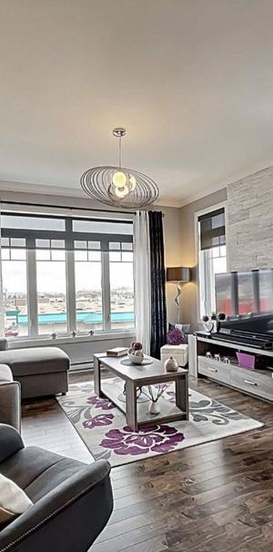 Condo 4 ½ lumineux avec vue sur la ville 2 stationnements - 1580$ /mois - Disponible le 1er juillet - Photo 1