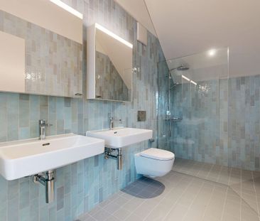 Modern new construction apartment in the center of Niederhasli - Photo 3